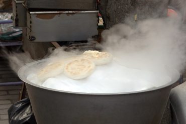 steaming food on a pot