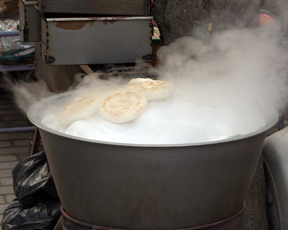 steaming food on a pot