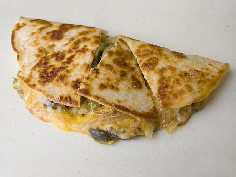 quesadilla cut into four quarters