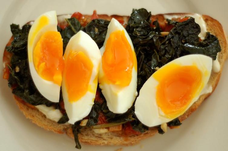 tomato and egg breakfast served on a plate