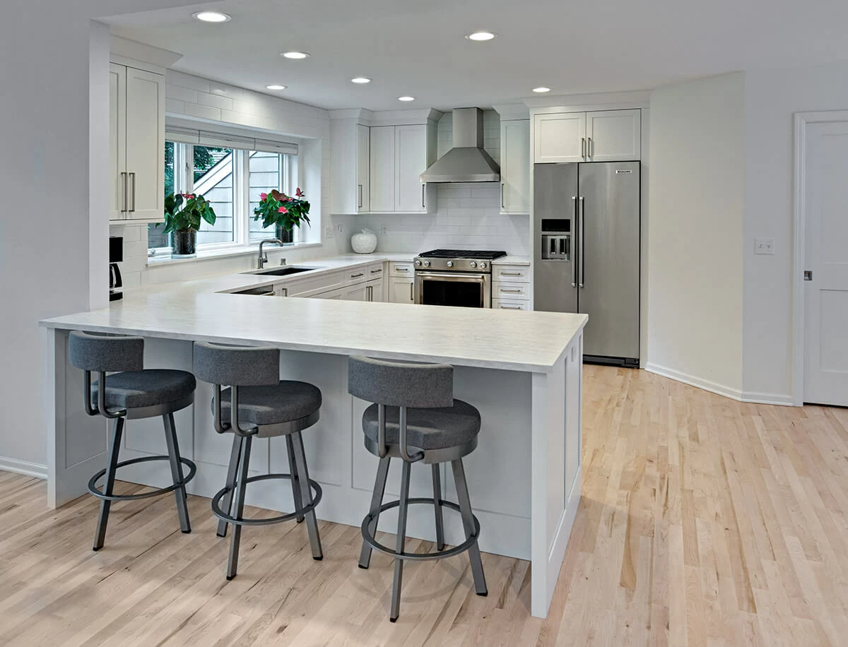 a kitchen with stools