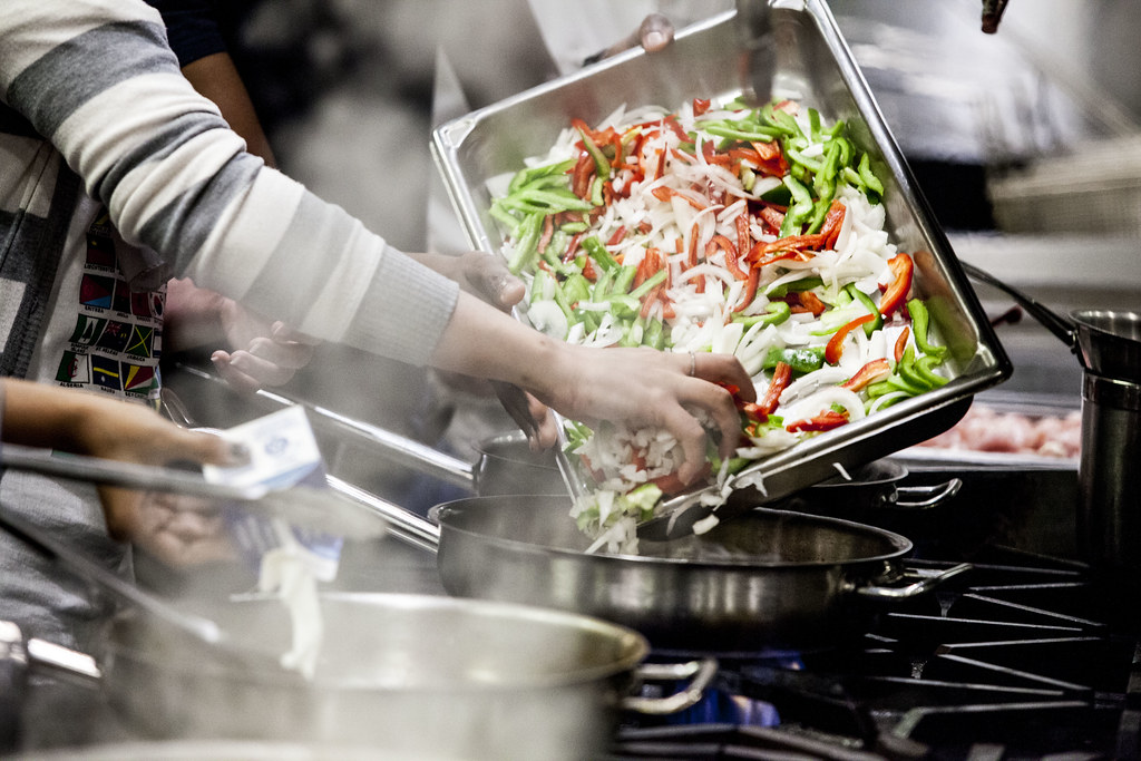 A beginner cook prepares food