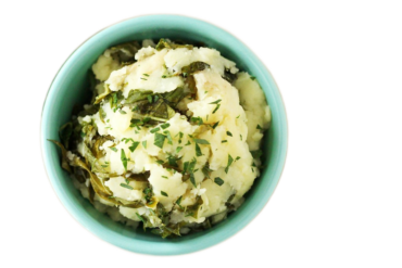 A bowl of mashed potatoes and veggies