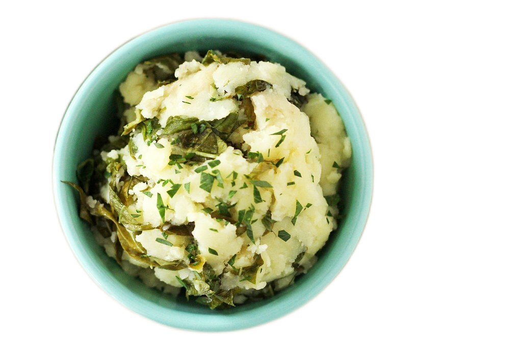 A bowl of mashed potatoes and veggies
