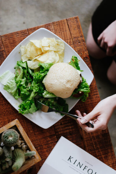 A woman eats lunch at work