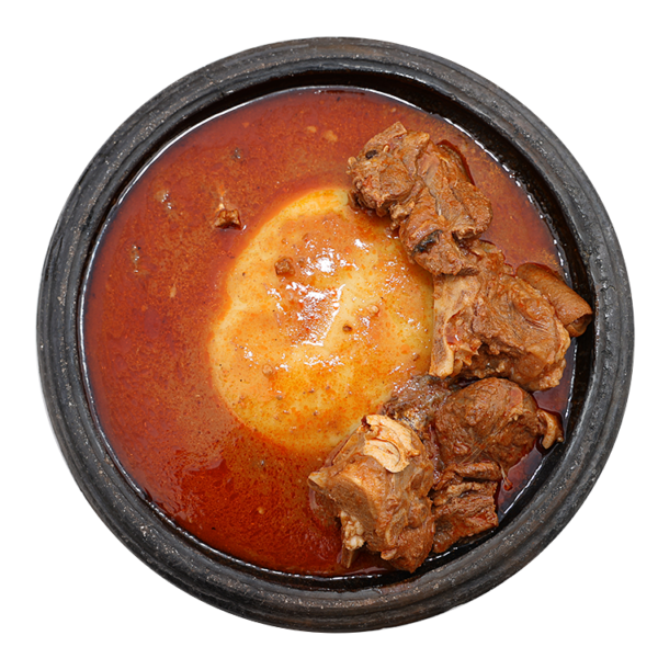 A bowl of Ghana food called fufu and light soup